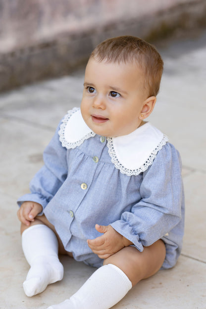 Fluffy blue with a lace collar.