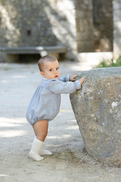 Fluffy blue with a lace collar.