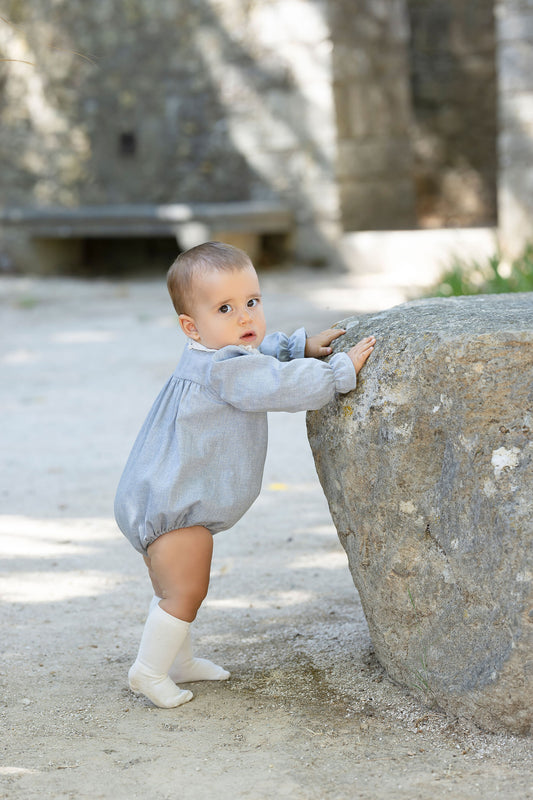 Fluffy blue with a lace collar.
