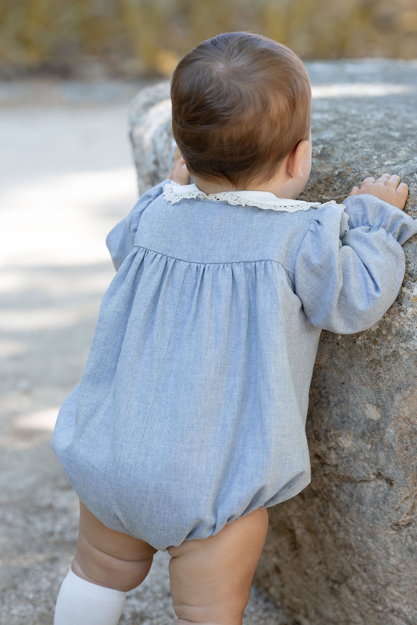 Fluffy blue with a lace collar.