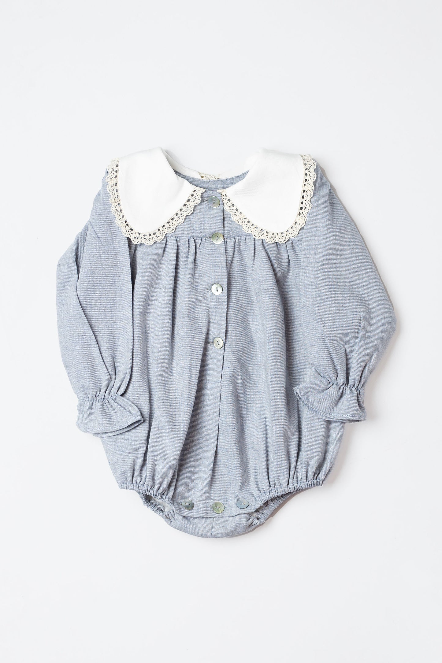 Fluffy blue with a lace collar.