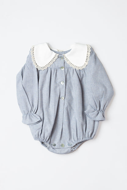 Fluffy blue with a lace collar.